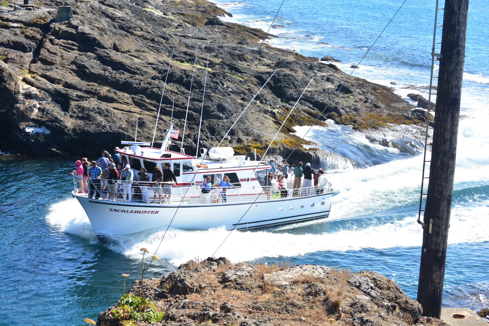 Charter fishing boat 'Tacklebuster' entering Depoe Bay harbor
