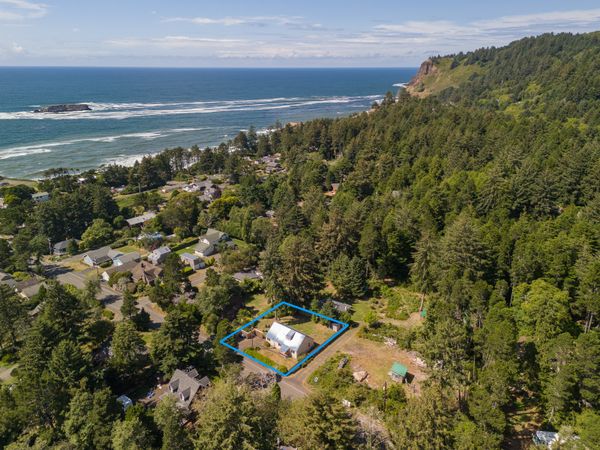 Aerial view of Otter Rock House and coastline