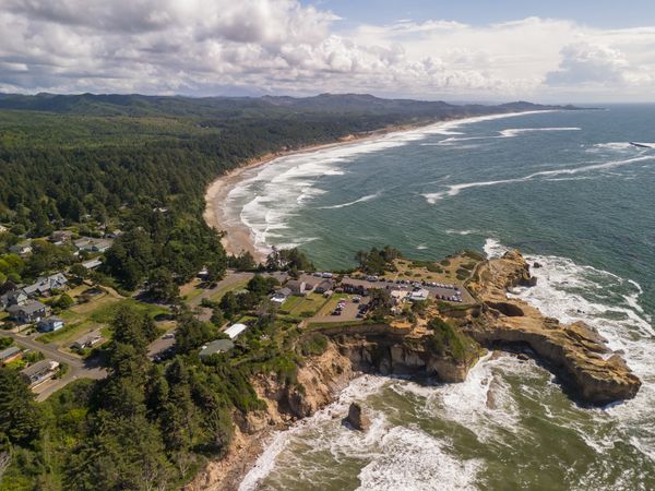 Aerial view of the Devil's Punchbowl headland and beach